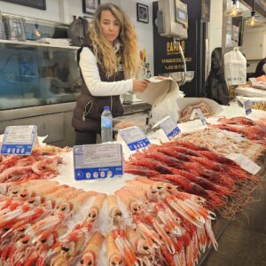 Fresh seafood market display with shrimps and lobsters in Costa de la Luz, Spain.